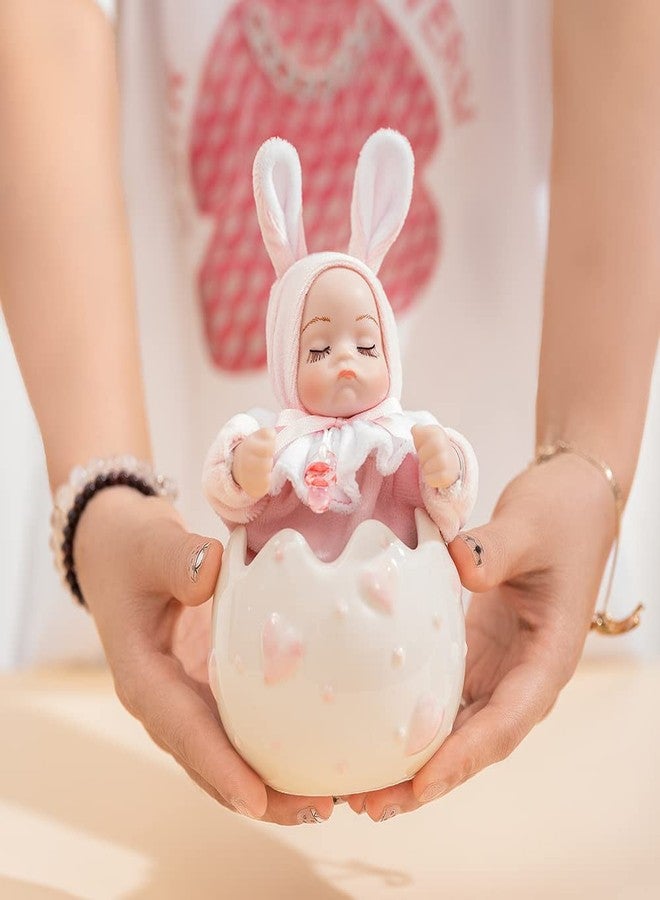 دمية هزازة الرأس على شكل قشر بيضة مع صندوق موسيقي للأطفال، هدية مثالية للبنات والأولاد، مناسبة للأخت والابن والابنة والأم والحفيدة والحفيد، ولحفلات التعميد وحفلات استقبال المولود، ولزينة أعياد الميلاد والكريسماس. - Image 3